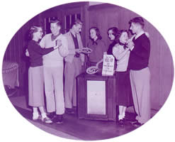 UW students gather in what appears to be the HUB for merry making a Nickel Hop to benefit Women's Living Groups in this 1940s vintage photo. Photo courtesy Special collections, UW Libraries.