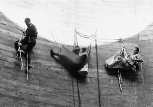 A 1969 mountain climbing class on the UW campus gives these three UW students a chance to hang out in high places.  File photo.