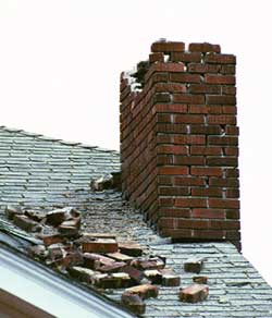 A house in West Seattle shows chimney damage caused by the Nisqually earthquake. Photo by John Shea, FEMA News Photo.