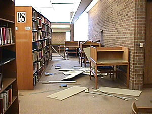 Furniture and books show disarray in the Odegaard Undergraduate Library. Photo by Mary Levin.