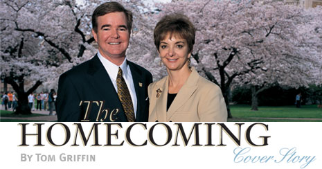 The Homecoming. By Tom Griffin. Incoming UW President Mark Emmert, '75, and his wife, Delanie, stand in the Quad as the cherries reach their peak. Photo by Kathy Sauber.