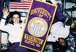 Michael Anderson, '81, with fellow UW alumnua Bonnie Dunbar.