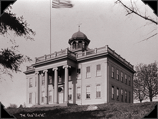 This photo of the original Territorial University building (now the site of the Olympic Hotel in downtown Seattle) shows the columns as they looked when constructed in 1861.