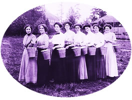 Eight coeds from the 1910s line up in this unidentified photograph. They may have been part of the May 1st Campus Day work parties that took place under the direction of Professor Edmond Meany each year. Photo courtesy Special Collections, University Libraries.