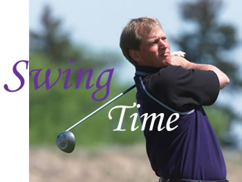 Football Coach Neuheisel takes a swing during the 2001 stop in yakima. Photo by Roy Musitelli, copyright 2001 Yakima Herald-Republic.