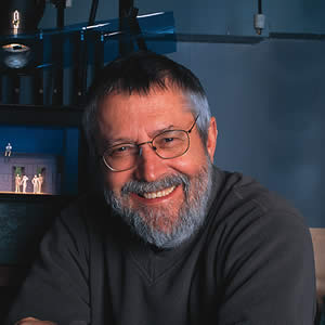 Professor Jon Jory relaxes in the drama school's design studio. Photo by Mary Levin.