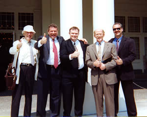 Bob Waterstson (second from right) celebrates the conclusion of the Human Genome Project on the steps of the White House with (left to right) Jim Watson, Eric Lander, Richard Gibbs and Richard Wilson.