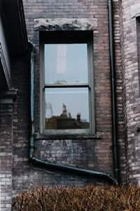 Water leaks are slowly eroding away the mortar between bricks in Clark Hall. Photo by Kathy Sauber.