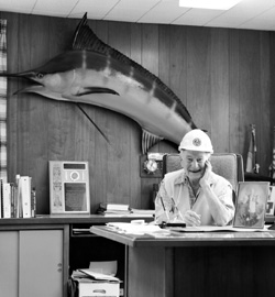 Palmer Koon, '33, in the office of his construction firm. Photo by Joel Levin