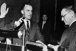 Evans is sworn in as governor for the first time in 1965. He was later named one of the top 10 governors of the 20th century in a University of Michigan study. Photo courtesy of Dan Evans. Evans is sworn in as governor for the first time in 1965. He was later named one of the top 10 governors of the 20th century in a University of Michigan study. Photo courtesy of Dan Evans.