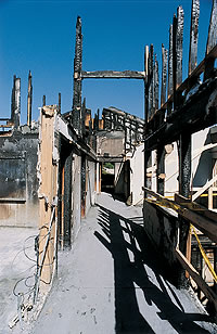 Merrill Hall is in ruins after a May 21 arson attack that caused $4 million in damages. Photo by Mary Levin.