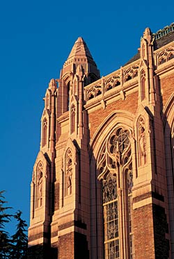 Sunlight illuminates the pinnacles and towers of Suzzallo. Photo copyright Loyd C. Heath.