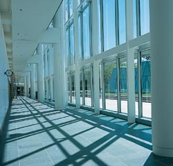An elegant corridor of glistening glass and panoramic views will envelop students and faculty alike. Photo by Kathy Sauber.