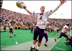 Husky Damon Huard celebrates UW win over California, 1993