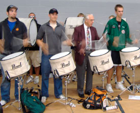 Bert Pound rocks out with HMB Drumline members.