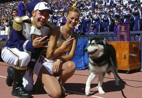 Drum Major Tyler Leitch and Feature Twirler Catherine Watters with Husky mascot Dubs.