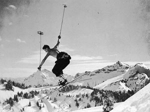 Skier making a cornice jump near Edith Creek, southeast slope of Mount Rainier, date unknown