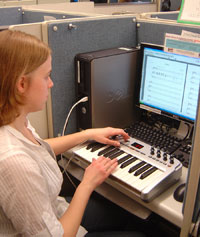 Senior Michelle McKenzie demonstrates the music composition software.