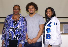 Dr. Lange, left, Jonathan Amosa and Brown