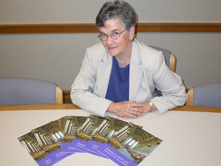 Betty Feetham with new recruitment brochures designed exclusively for recruiting Chinese students.
