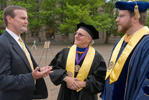 From left: Malcolm Cleary, Dean Emeritus Michael Eisenberg, and Associate Dean Matthew Saxton