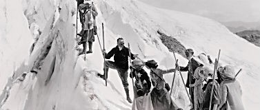 Archive photo of climbers ascending a mountain.