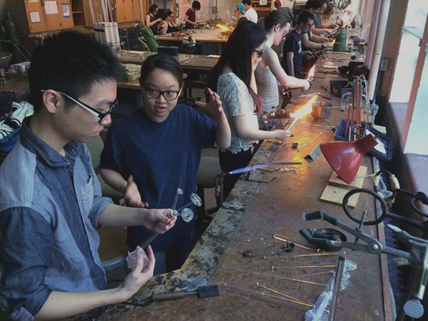 Students working with glass