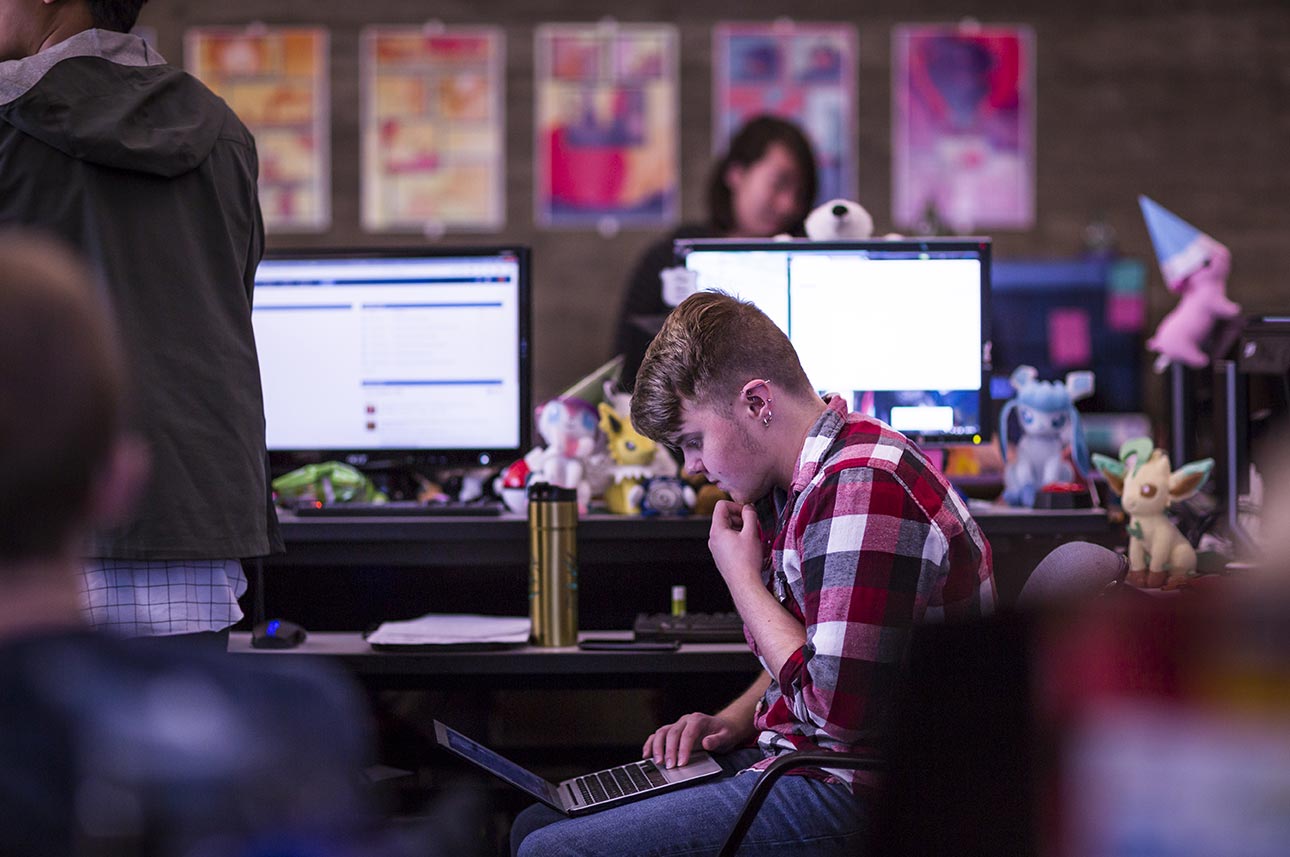 Lead designer Emmett Scout concentrates during a busy day at the Digital Future Lab