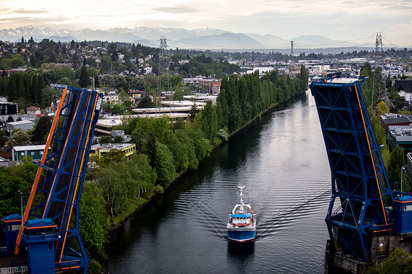 The R/V Carson passes under the Fremont Bridge on its way back to the UW.
