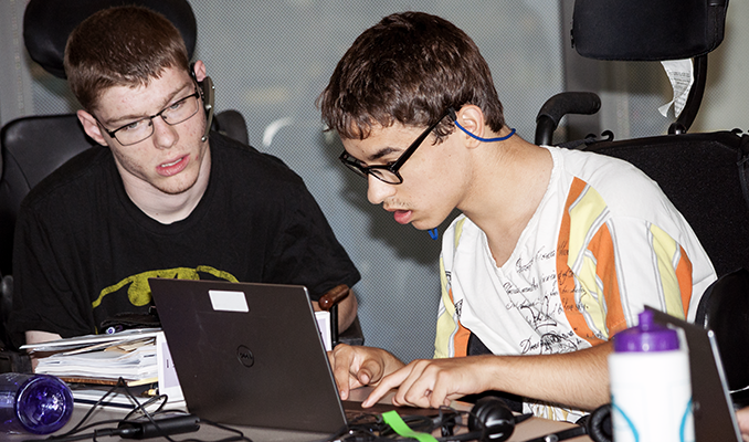 Two students working on a computing project