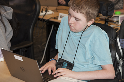 A student using a computer.