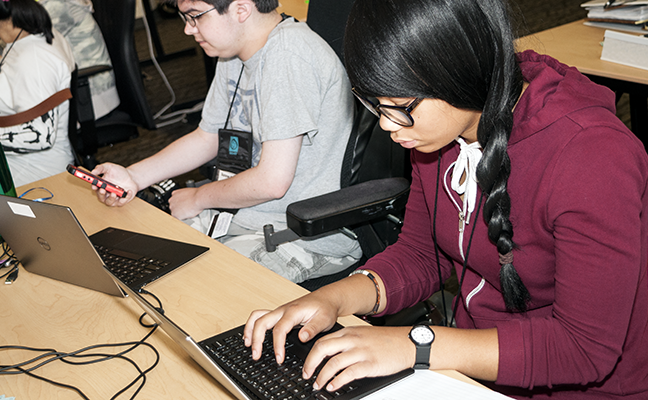 Two students working in a computer lab
