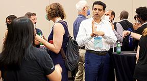 AccessComputing PIs, partners, and participants mingle at Tapia 2022.