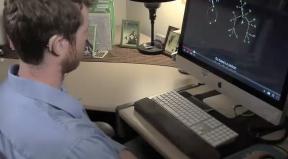 
Still image from video: A deaf student watches a video with captions
