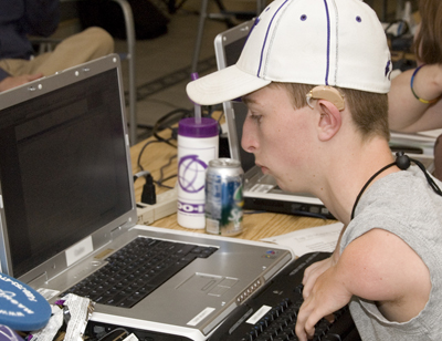 A student using an accessible keyboard