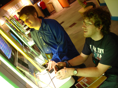 Two students interacting with a computer