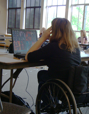 A student working on her computer