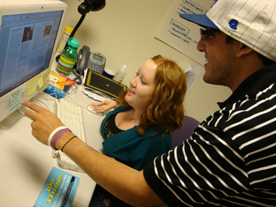 Image of staff working on a project for Engage in AccessComputing Nov 2012 page