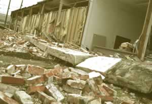 A Seattle retail shop shows massive earthquake damage. Photo by Kevin Galvin, FEMA News Photo.