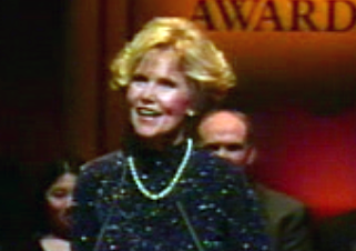 still image from video Golden Apple showing DO-IT Director Sheryl Burgstahler giving an acceptance speech for the Golden Apple Award