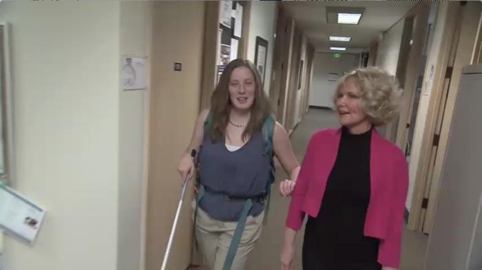 Cindy and Sheryl walking down the hall.