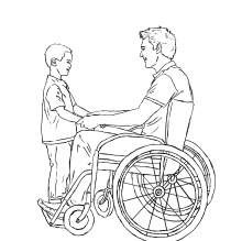 Man in a wheelchair talking to a boy who is standing.