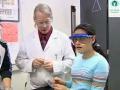 still image from video Equal Access Sensory showing students performing an experiment with an instructor
