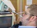still image from video Taking Charge 1 showing male student using assistive technology