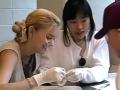 still image from video WT Science Teachers showing two DO-IT students dissecting