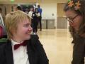 A student in a wheelchair meets a job recruiter.