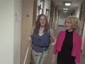 Cindy and Sheryl walking down the hall.