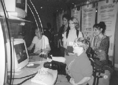 Lacey using a computer at the Microsoft Museum