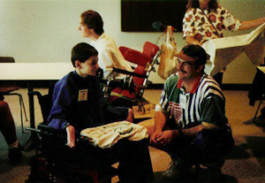 Dan Chats with Phase II Scholar Matthew at the 1995 Summer Study. Picture of Dan talking with Mathew Porter.