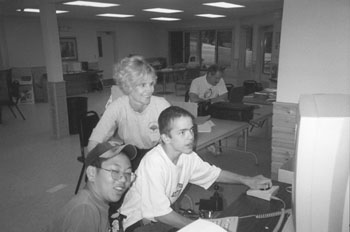 Picture of Sheryl with Students at Camp Courage